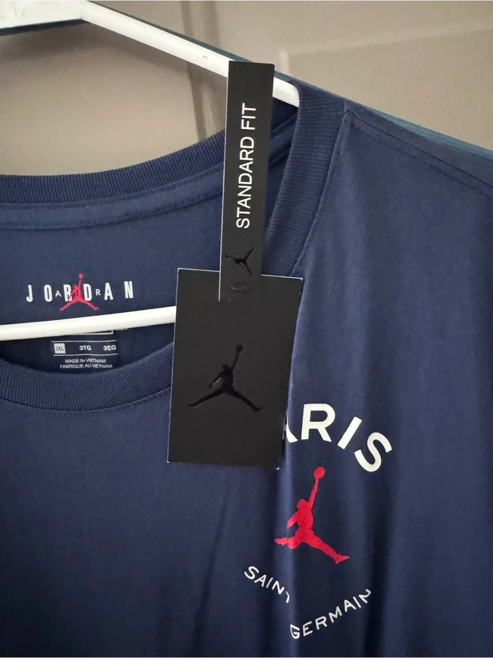 Jordan Men’s Navy Short Sleeve PSG Logo Tee with Red Jumpman
